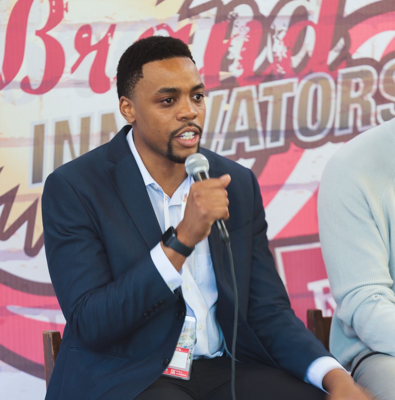 Tinashe Chaponda speaking at a Brand Innovators panel.