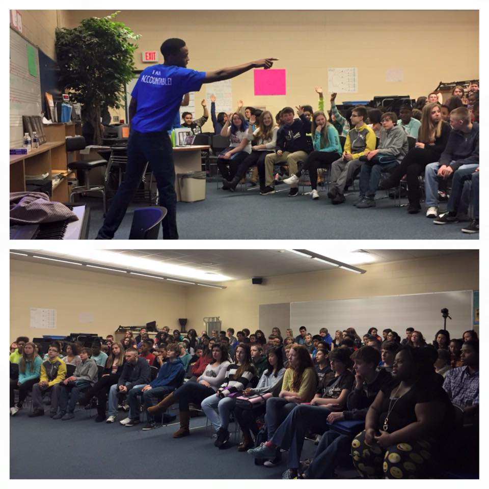 Tinashe Chaponda speaking at Milwood Middle School assembly